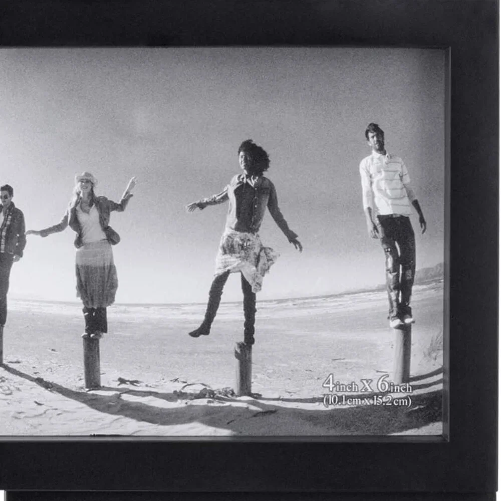 Sleek 4-Opening Black Matted Frame - Displays Four 4x6 Photos Effortlessly